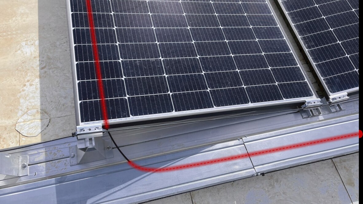 Dashed line shows cable installation on solar panel Ensuring reliability of solar farm cables with AP Sensing fiber optic monitoring