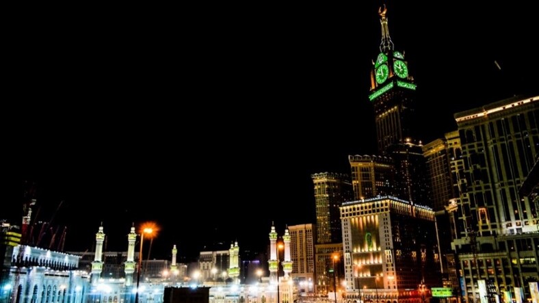 Night view of a complex with a clock tower. AP Sensing fiber optic sensing monitors and protects critical large-scale structures Night view of a complex with a clock tower. AP Sensing fiber optic sensing monitors and protects critical large-scale structures