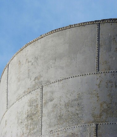 Large industrial tank structure, representing assets monitored by AP Sensing fiber optic systems Large industrial tank structure, representing assets monitored by AP Sensing fiber optic systems