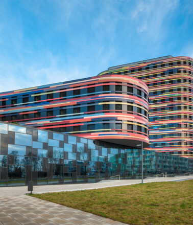 Modern, colorful building facade illustrating environments suitable for AP Sensing's fiber optic monitoring solutions Modern, colorful building facade illustrating environments suitable for AP Sensing's fiber optic monitoring solutions