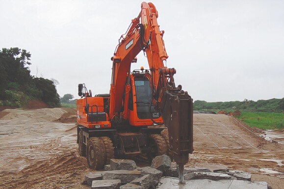 Excavator in construction area, relevant to monitoring critical infrastructure projects with AP Sensing fiber optic sensing Excavator in construction area, relevant to monitoring critical infrastructure projects with AP Sensing fiber optic sensing