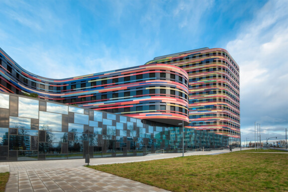 Modern, colorful building facade illustrating environments suitable for AP Sensing's fiber optic monitoring solutions Modern, colorful building facade illustrating environments suitable for AP Sensing's fiber optic monitoring solutions