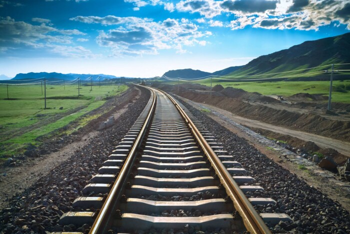 Railway track in landscape: AP Sensing offers advanced solutions for reliable rail infrastructure monitoring Railway track in landscape: AP Sensing offers advanced solutions for reliable rail infrastructure monitoring